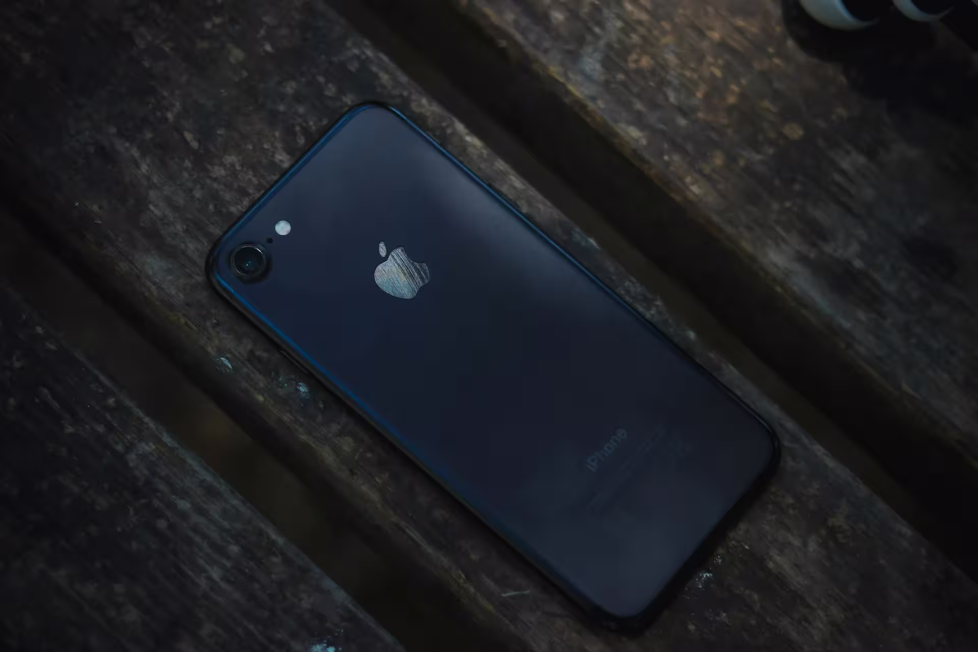 Picture of iphone laying on wood